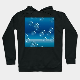 Blue bubbles on ocean horizon Hoodie